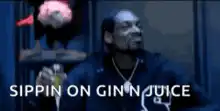 Snoop Dogg sippin on gin n juice