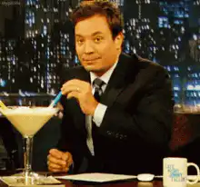 Jimmy Fallon Stirs Drink and Smiles