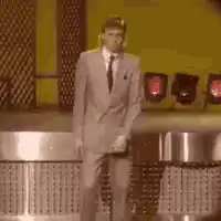 Elvis Presley dancing on stage