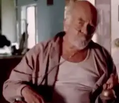 Old man nodding with a drink