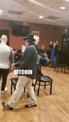 people dancing in a bar