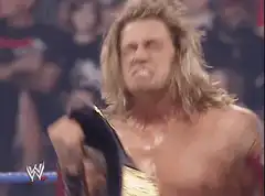 Dude Love raises championship belt