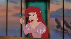 Ariel uses a fork as a hairbrush