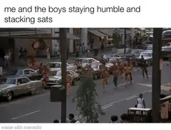 men in underwear running through city streets
