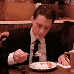 Patrick Swayze eating dessert