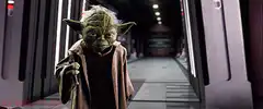 Yoda ignites green lightsaber