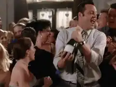 Vince and Owen popping champagne