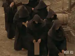 Monks bowing with books