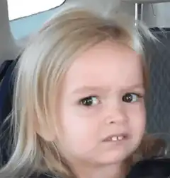 suspicious looking blonde girl