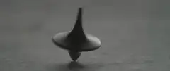 Spinning top wobbling