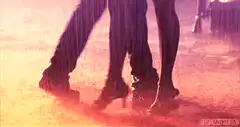 Legs walking in heavy rain