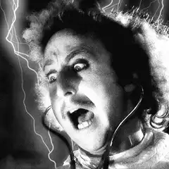 Man with wires in ears screaming with lightning