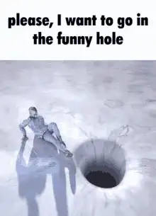 Man sliding into funny hole