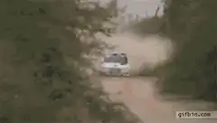car flips over on dirt road