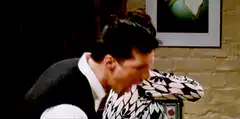Woman slaps man in black and white pattern