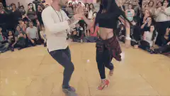 Couple performing dramatic bachata dip