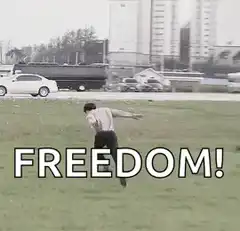 Man running with arms outstretched shouting freedom