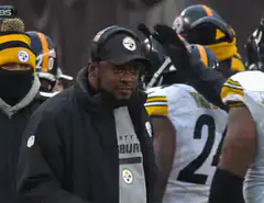 Mike Tomlin pointing and smiling
