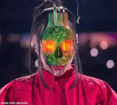 Woman with glowing green skull face