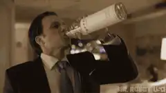 Mr. Robot drinking from a bottle