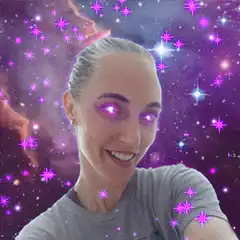 Woman with glowing purple eyes in space