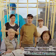 Ngai Chun Cheung family in a golden cage