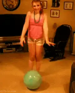 Girl falls off exercise ball