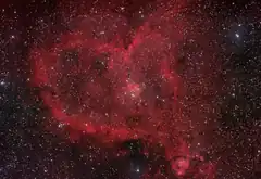 red heart-shaped nebula in space
