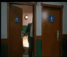 Man exits bathroom relieved