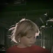 Boy's hair stands on end with static electricity