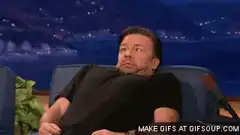 Ricky Gervais laughing on talk show