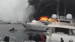 Yacht engulfed in flames at dock