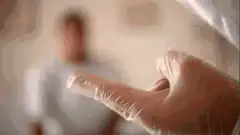 Doctor drops ice on patient's finger