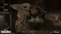 Grogu hugs the rat creature