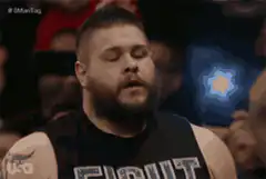 Kevin Owens head roll back