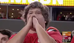 Clemson fan praying for victory