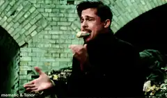 Brad Pitt eating bread in Se7en