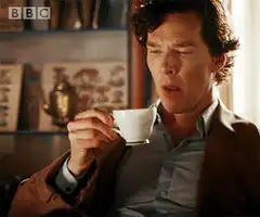 Benedict Cumberbatch sips tea and looks surprised