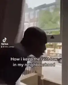 Man shooting bird out of window