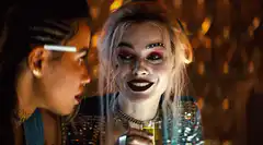 Harley Quinn drinks and laughs