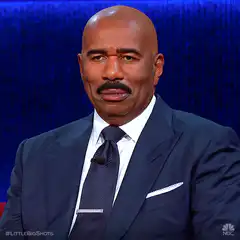 Steve Harvey Smirking