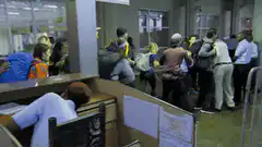 People running in panic inside a building