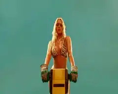 Woman on yellow motorcycle