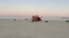 Red rooster art car at Burning Man