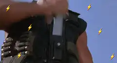 Arnold Schwarzenegger loads rifle