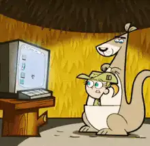 Kangaroo and boy use computer mouse