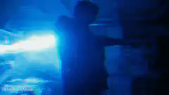 The Flash zaps a man with lightning