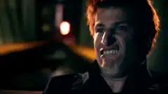 Guy with braces making a face