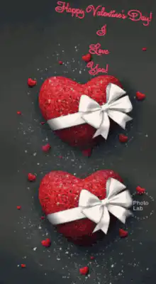 Two red glitter hearts with white bows