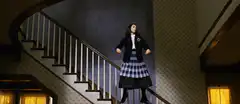 Wednesday Addams dancing on stairs